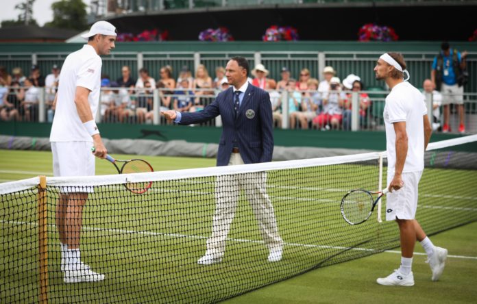 BRITAIN TENNIS WIMBLEDON R2 BEMELMANS VS ISNER
